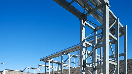 An exterior photograph of cooling pipes in Storey County, Nevada, data center campus, bringing water to and from the data center to help cool our servers.