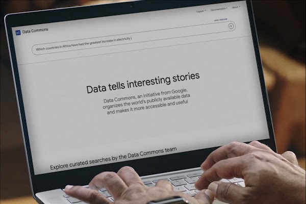 A laptop open to a page that reads "Data tells interesting stories"