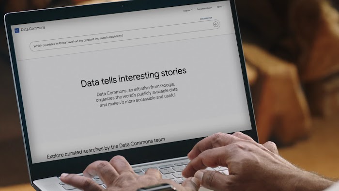 A laptop open to a page that reads "Data tells interesting stories"