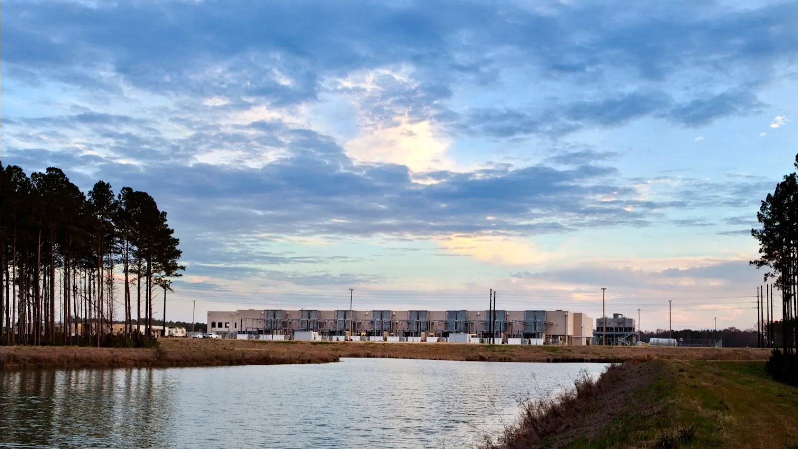 A view of a rain retention pond that cools the Google data center in the background. 