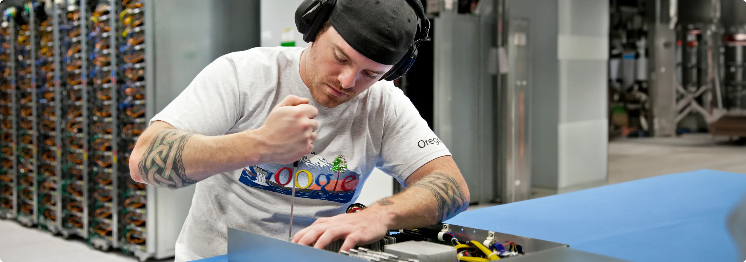 A Google facilities technician maintains the infrastructure of the critical systems inside a Google data center.