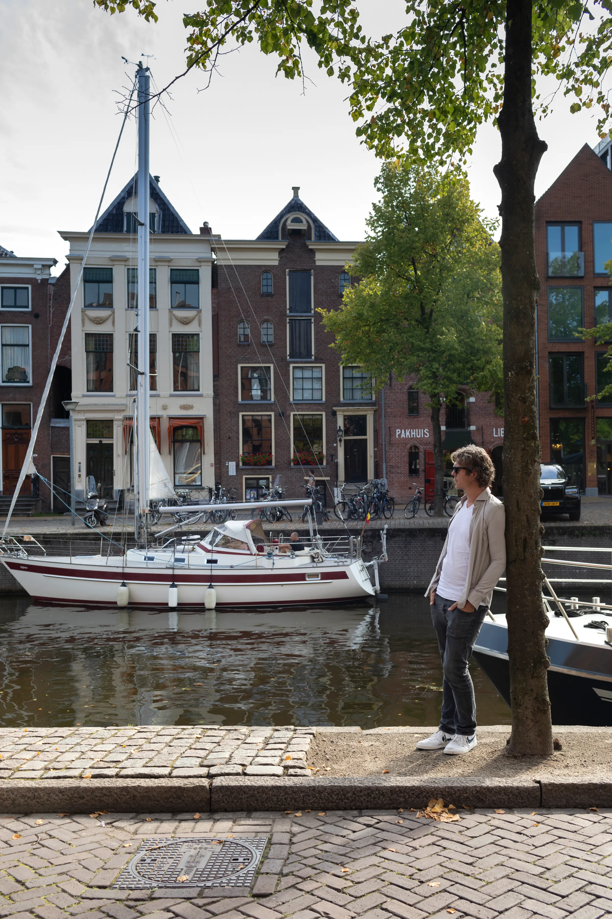 Googler Marco Ynema stands near a canal with boats floating by in Eemshaven, Netherlands