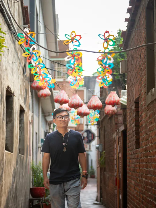 Googler Jerry Kuo walks through a colorful alley in Changhua County, Taiwan