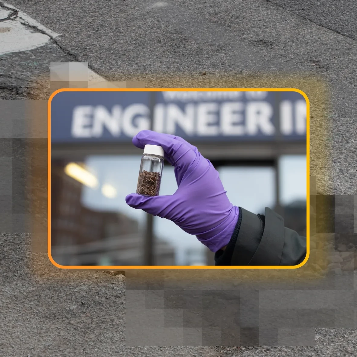 Picture of a cracked road with a test tube in the middle with asphalt and biomass in the tube