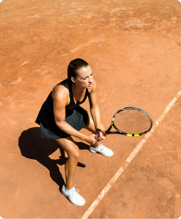 Person playing tennis