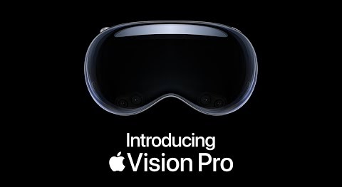 The Apple Vision Pro and text that reads, “Introducing Apple Vision Pro”