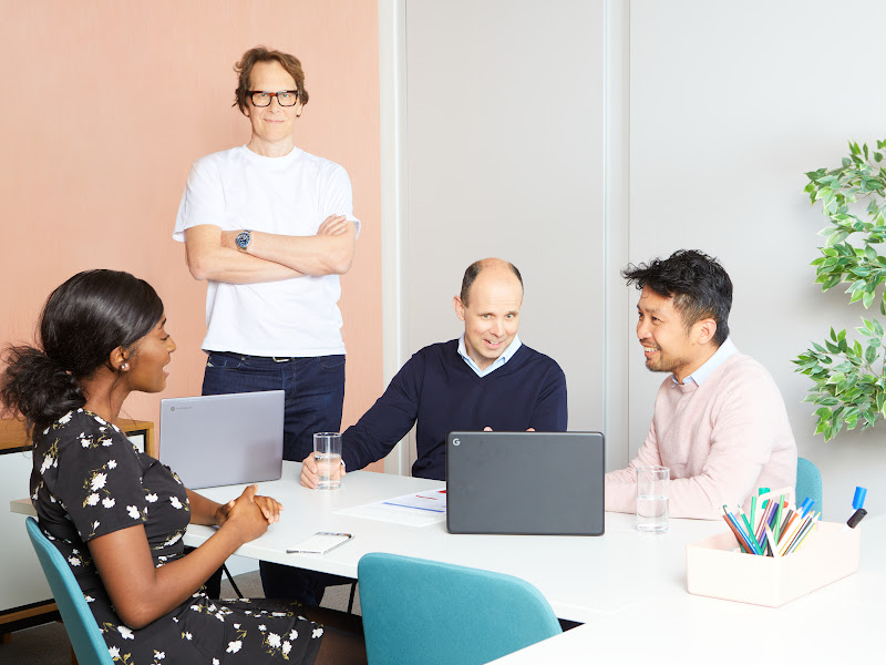 Currensea employees working in the office