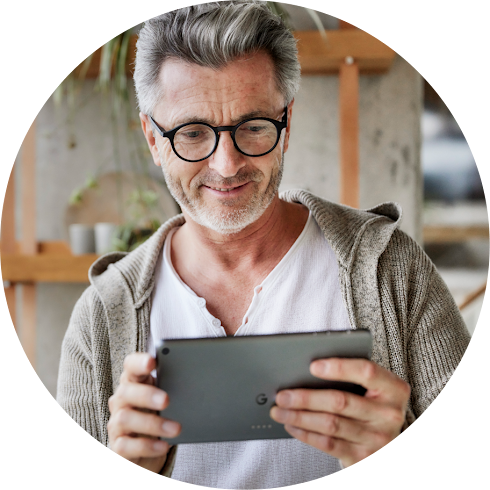 A business owner inside a store checks their Google Ads campaigns on a Pixel tablet.