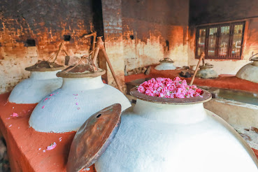 Perfume distillation pots with flowers inside