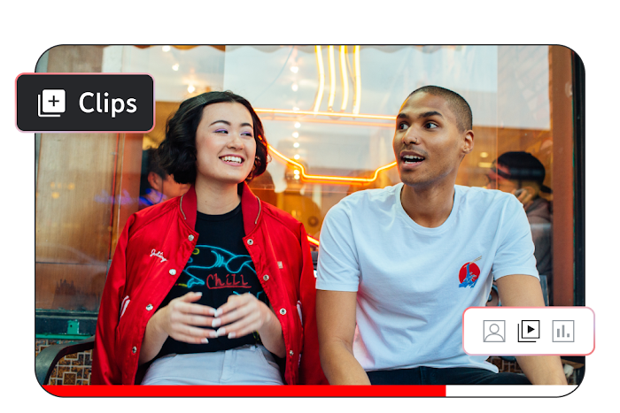 Image of two people sitting and talking outside of a restaurant with the word ‘Clips’ in the corner of the screen.