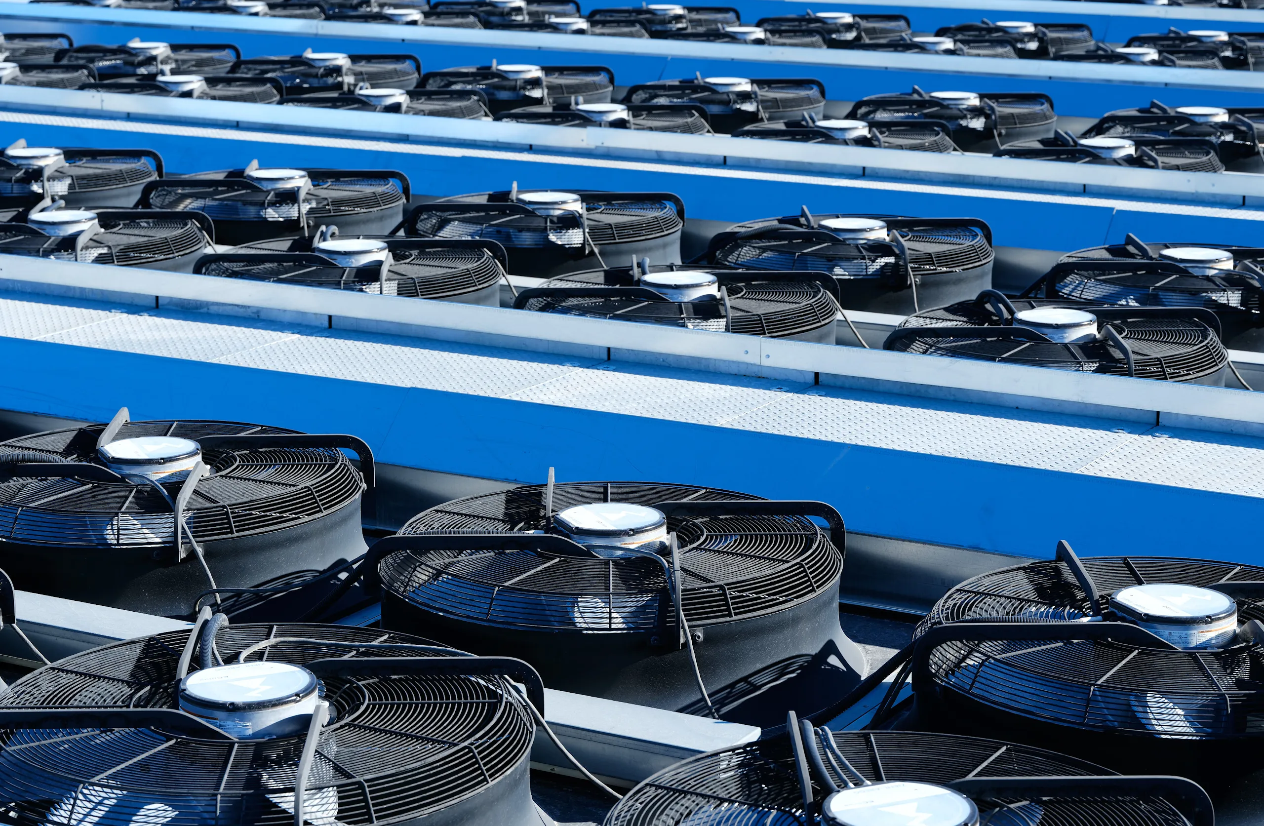 An exterior photograph close-up of cooling fans on top of dry coolers at one of Google's Storey County, Nevada, data centers.