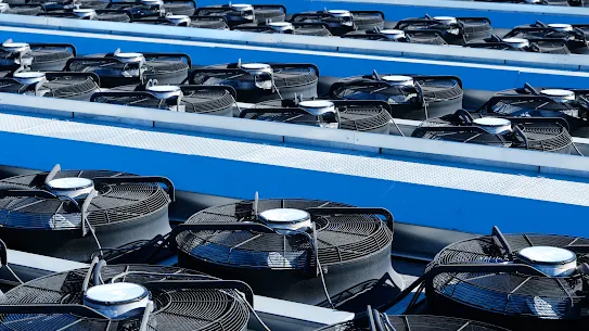 An exterior photograph close-up of cooling fans on top of dry coolers at one of Google's Storey County, Nevada, data centers.