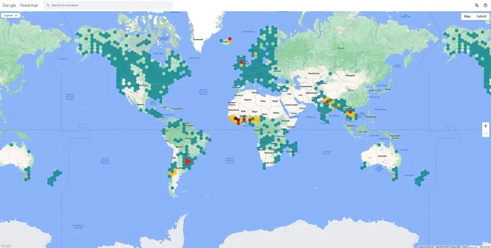 Flood Hub UI showing a map of the world with locations marked in yellow and red that are currently at risk of riverine floods.