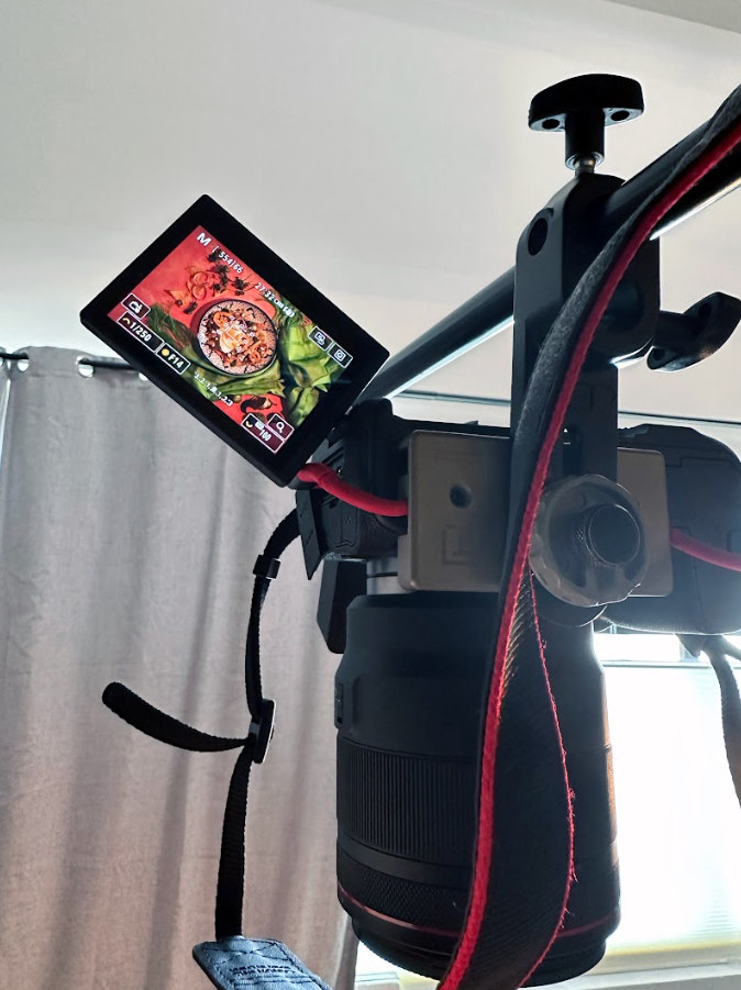 A camera set up with the image of the Doodle in the viewfinder of the camera. 